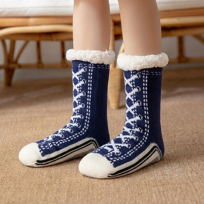 Fleece-lined sneaker-style slipper socks – navy pair standing indoors