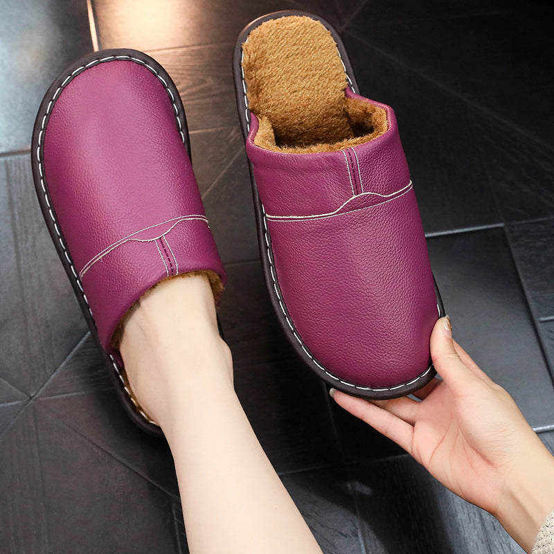 Auldweave warm wide fit leather slippers – purple slipper worn with matching pair held