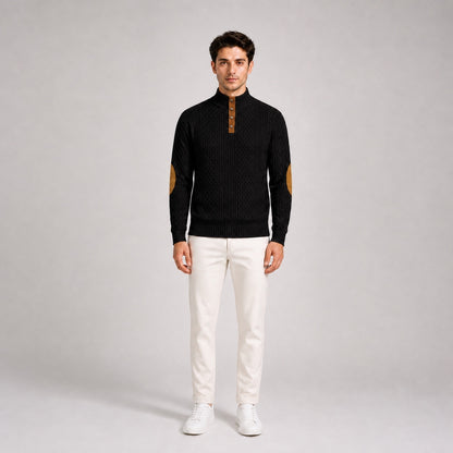 Model wearing the Black men's textured stand-collar pullover with white trousers, front full-body studio view