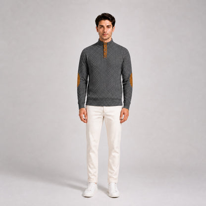 Model wearing the Charcoal Grey men's textured stand-collar pullover with white trousers, front full-body studio view
