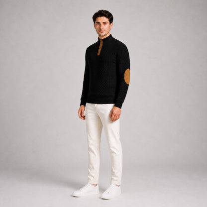 Model wearing the Black men's textured stand-collar pullover with white trousers, natural 45-degree studio view