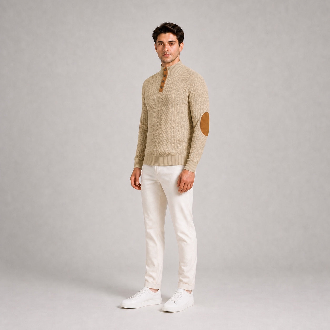 Model wearing the Oatmeal men's textured stand-collar pullover with white trousers, natural 45-degree studio view