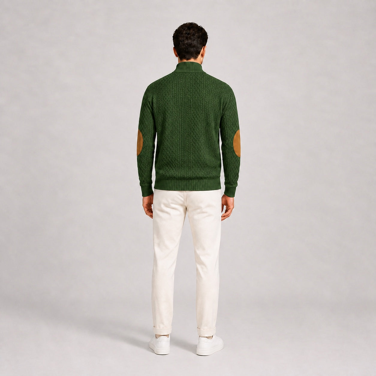 Model wearing the Forest Green men's textured stand-collar pullover with white trousers, back full-body studio view