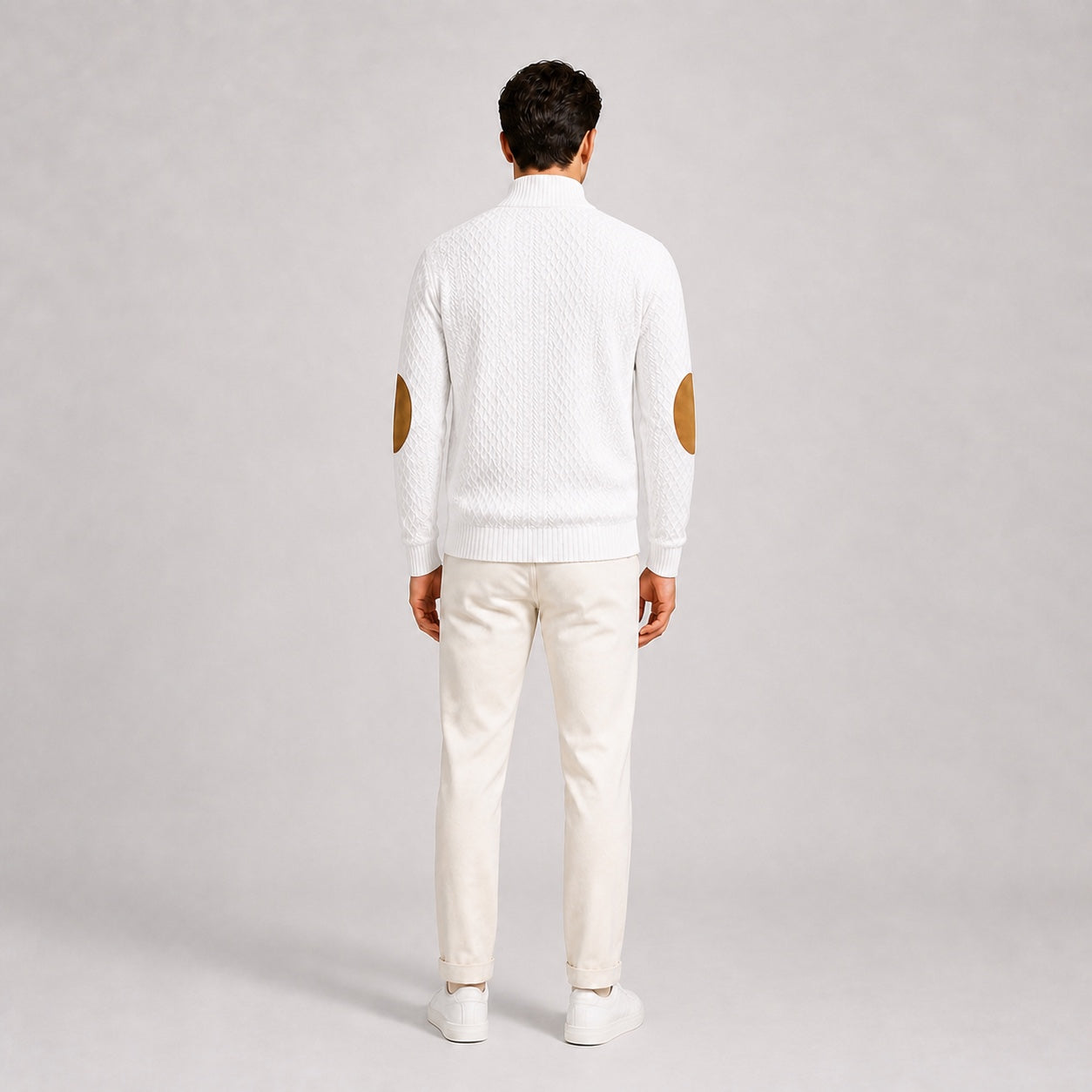 Model wearing the White men's textured stand-collar pullover with white trousers, back full-body studio view