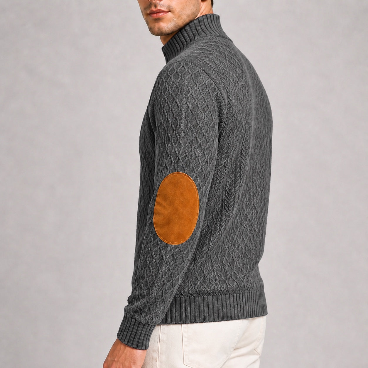 Close-up of the contrast elbow patch and jacquard texture on the Charcoal Grey men's stand-collar pullover