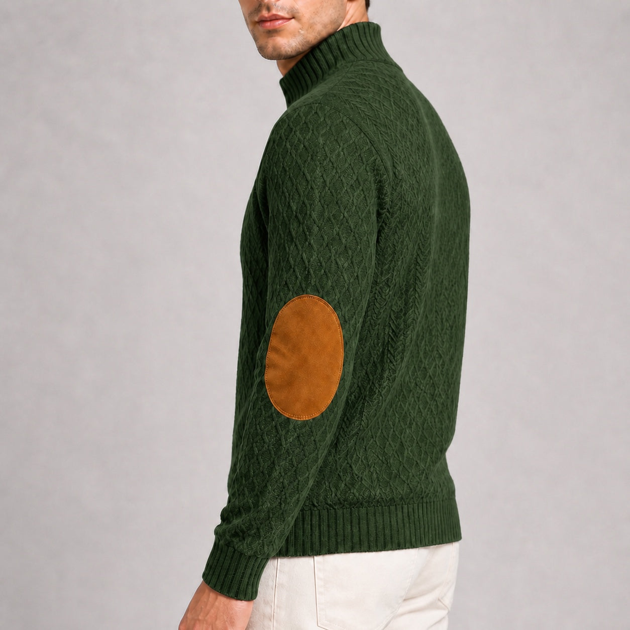 Close-up of the contrast elbow patch and jacquard texture on the Forest Green men's stand-collar pullover