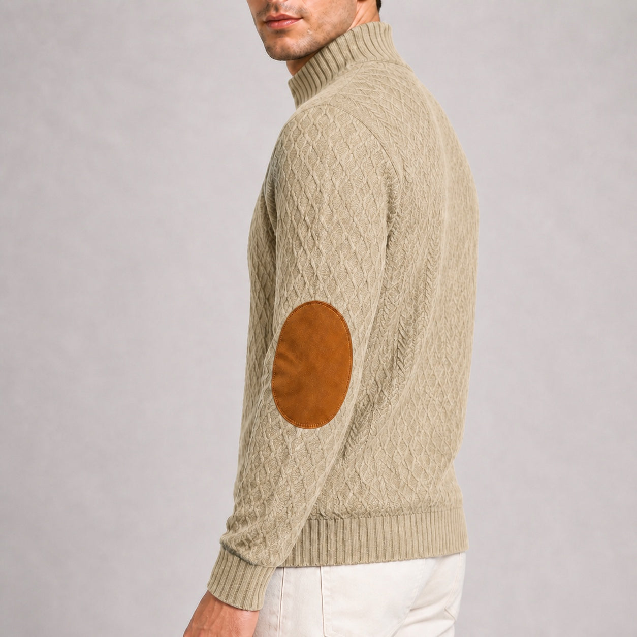 Close-up of the contrast elbow patch and jacquard texture on the Oatmeal men's stand-collar pullover