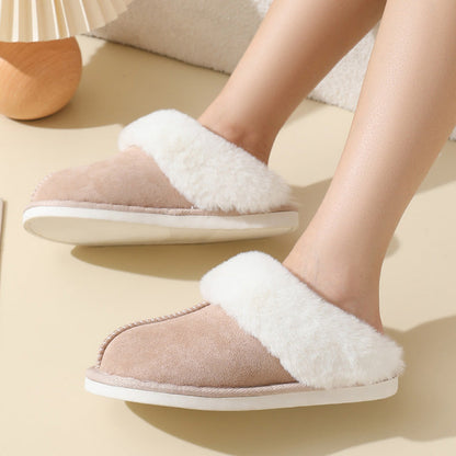 Pair of khaki slippers shown from the side