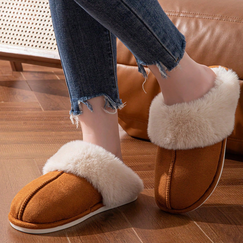 Brown faux fur slippers worn with denim