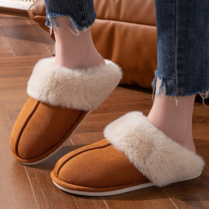 Front view of brown faux fur slippers being worn
