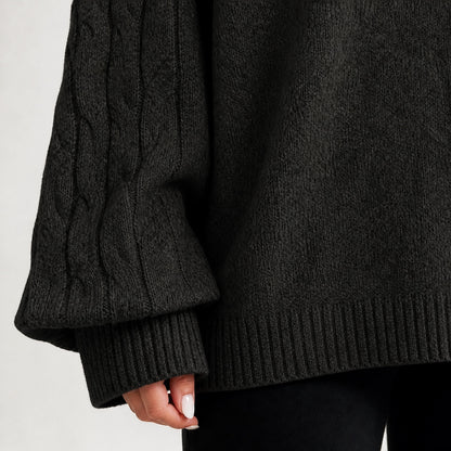 Black women's cold-shoulder mock-neck oversized knitted jumper, cable-knit sleeve, cuff and hem detail