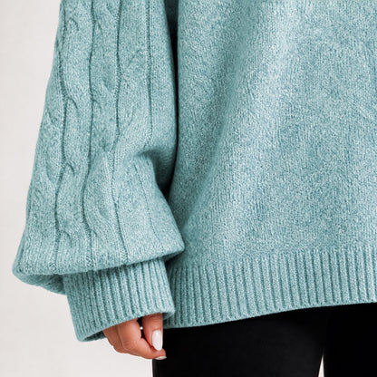 Soft Teal women's cold-shoulder mock-neck oversized knitted jumper, cable-knit sleeve, cuff and hem detail