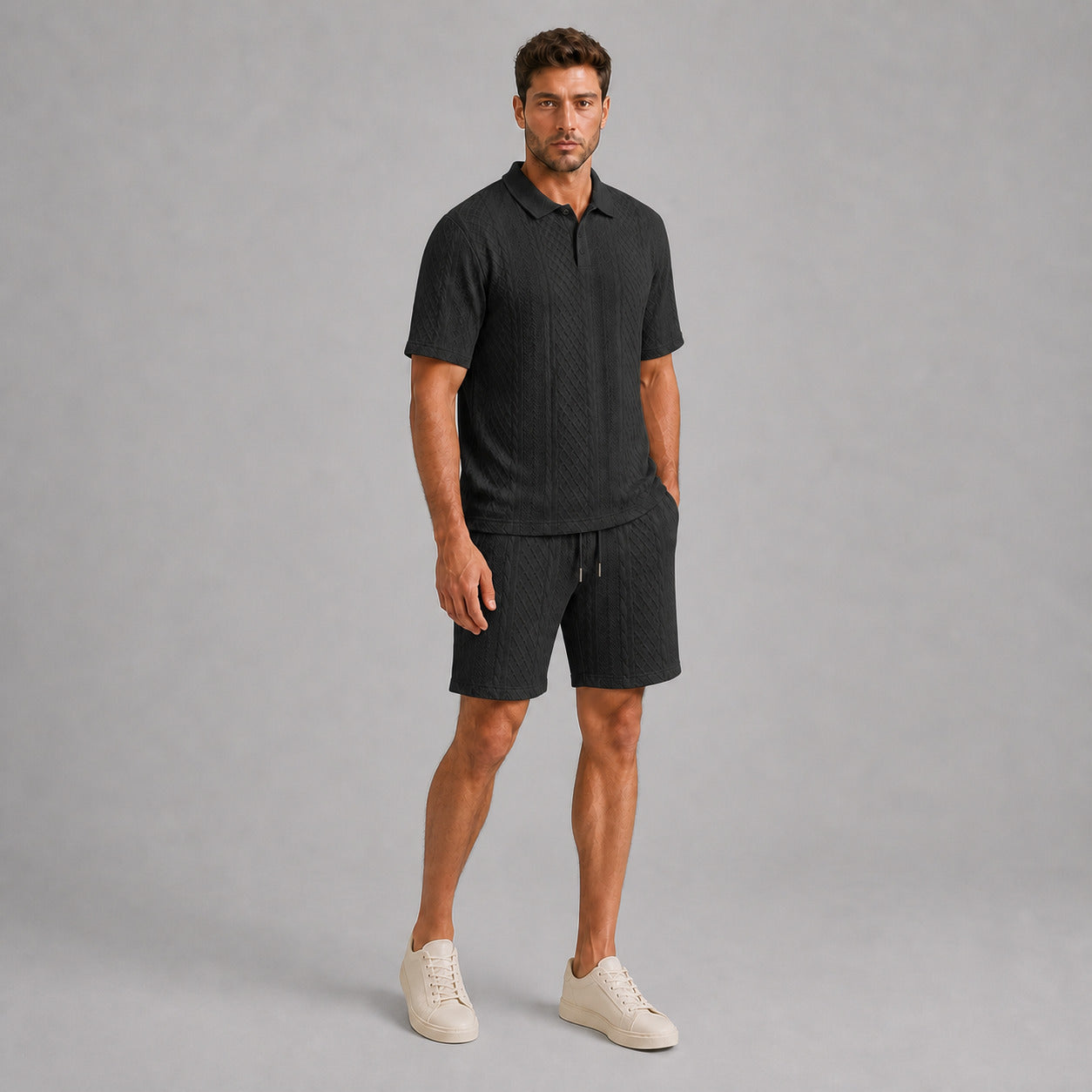 Black men's textured jacquard polo shirt and shorts set, natural 45-degree full-body view