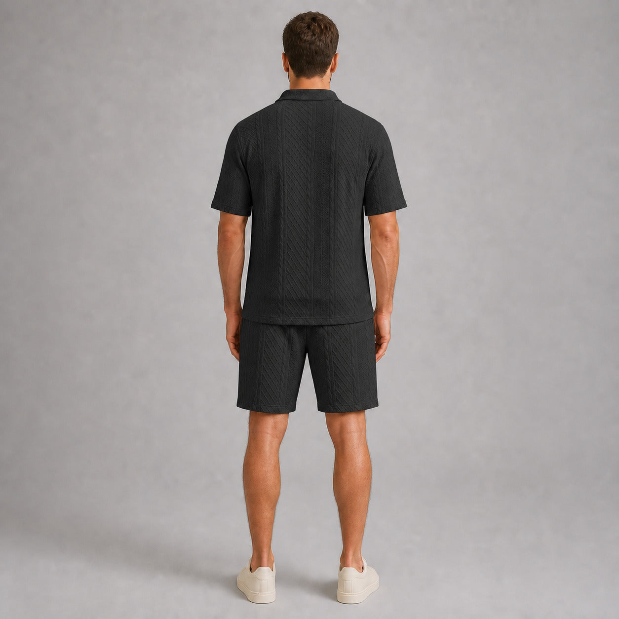 Black men's textured jacquard polo shirt and shorts set, back full-body view