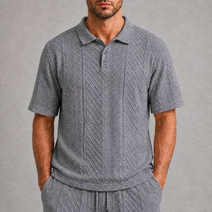 Mid Grey men's textured jacquard polo shirt, raised geometric texture close-up