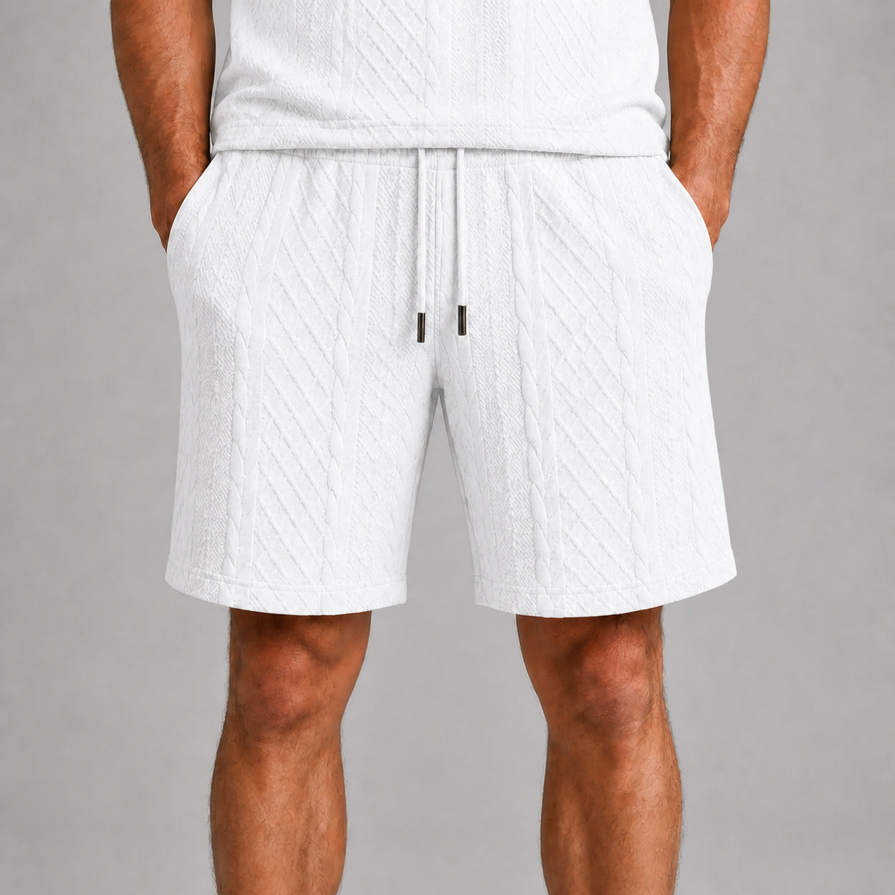White men's drawstring shorts, raised geometric texture close-up