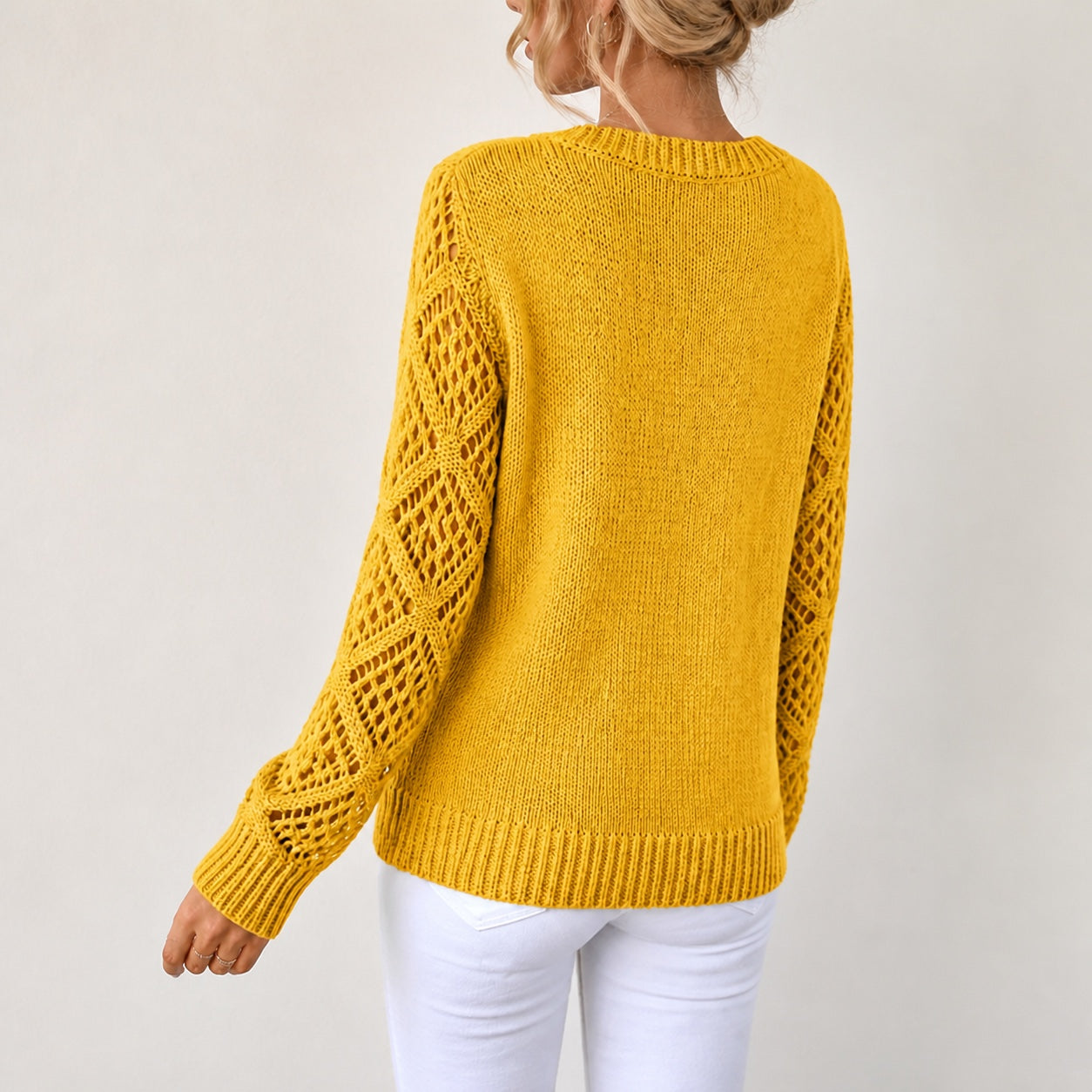 Mustard Yellow women's V-neck openwork sleeve knitted jumper, rear three-quarter view