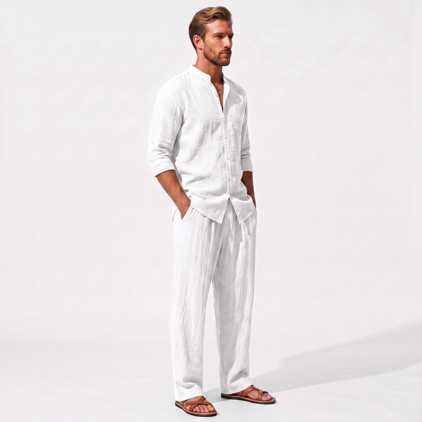 White men's two piece linen-blend set with Grandad collar shirt and straight-leg trousers, three-quarter model view