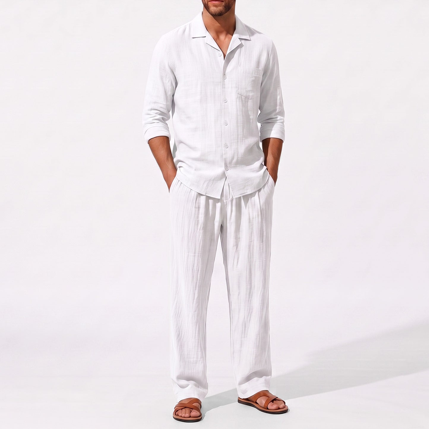 White men's two piece linen-blend set with Grandad collar shirt and straight-leg trousers, close front outfit detail