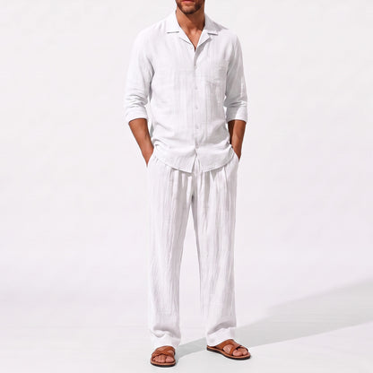 White men's two piece linen-blend set with Grandad collar shirt and straight-leg trousers, close front outfit detail