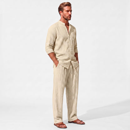 Beige men's two piece linen-blend set with Grandad collar shirt and straight-leg trousers, three-quarter model view