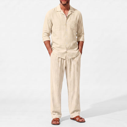 Beige men's two piece linen-blend set with Grandad collar shirt and straight-leg trousers, close front outfit detail