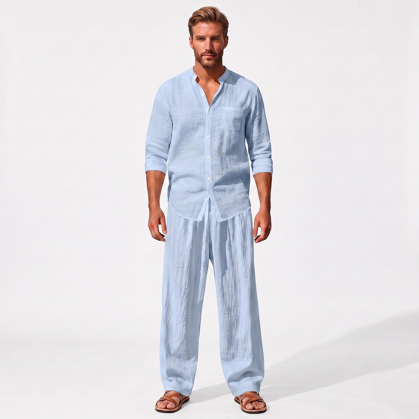 Blue men's two piece linen-blend set with Grandad collar shirt and straight-leg trousers, straight-on full-length model view