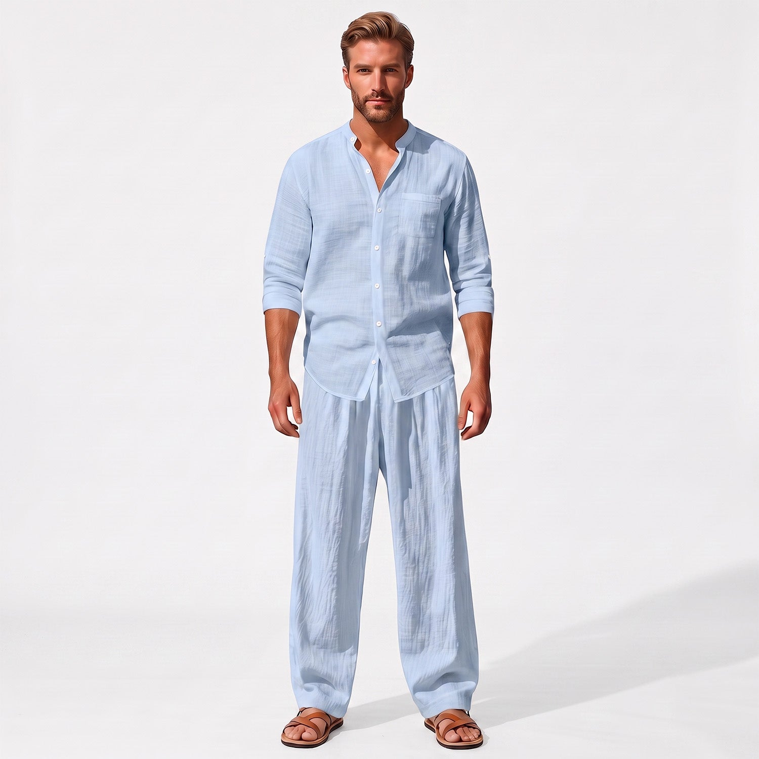 Blue men's two piece linen-blend set with Grandad collar shirt and straight-leg trousers, straight-on full-length model view