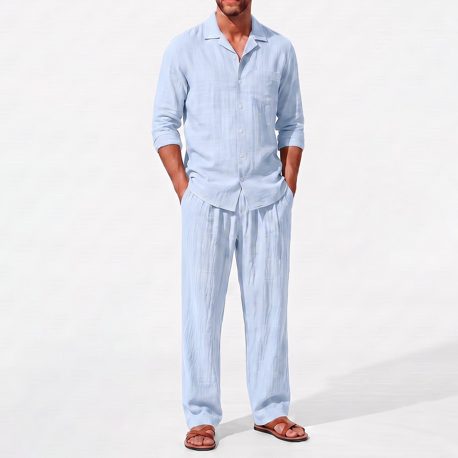 Blue men's two piece linen-blend set with Grandad collar shirt and straight-leg trousers, close front outfit detail