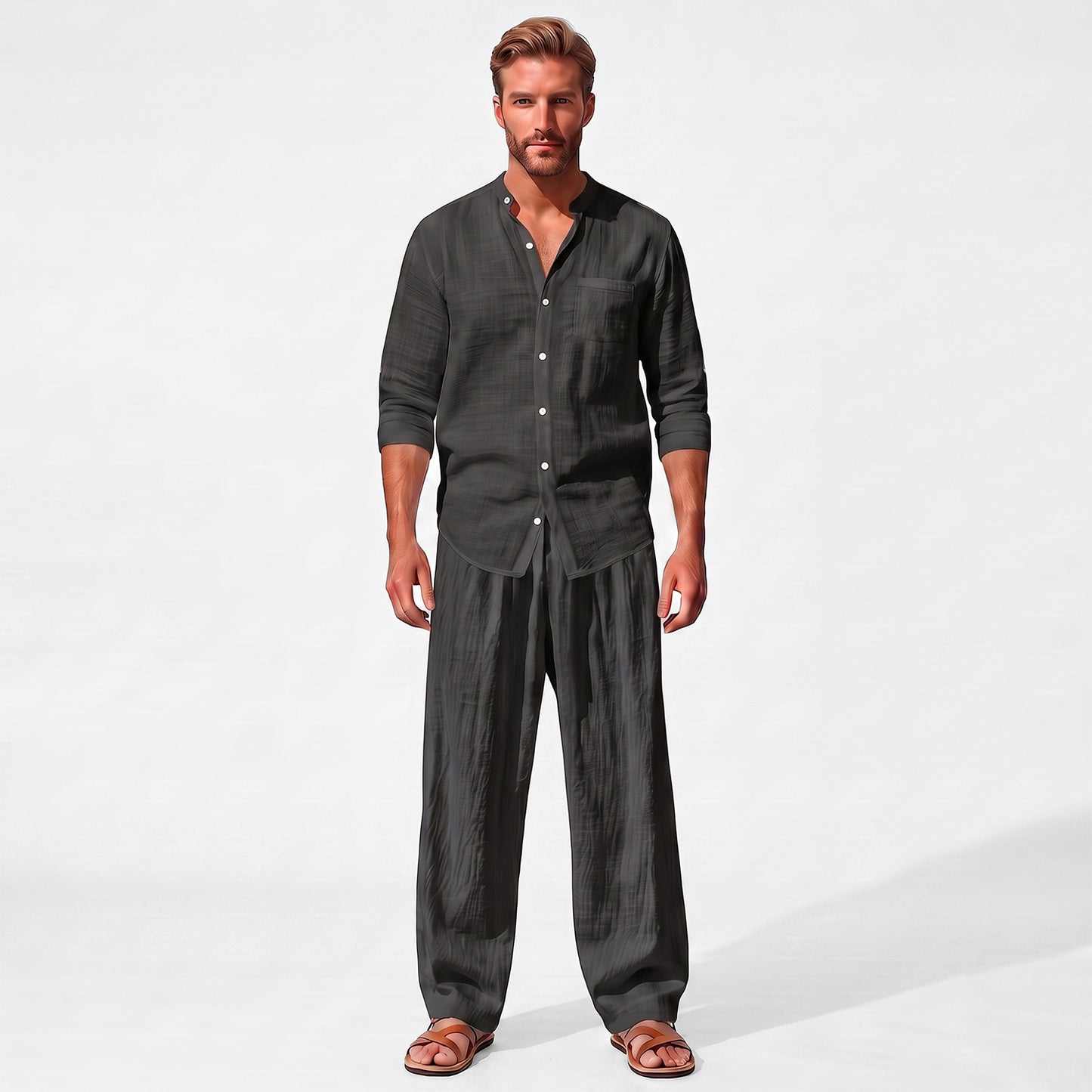 Black men's two piece linen-blend set with Grandad collar shirt and straight-leg trousers, straight-on full-length model view