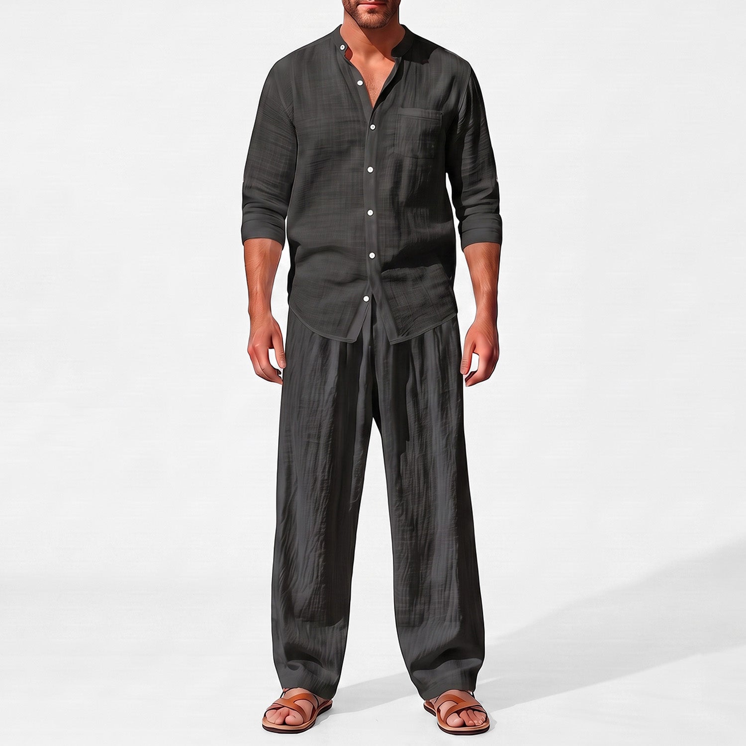Black men's two piece linen-blend set with Grandad collar shirt and straight-leg trousers, closer front outfit view
