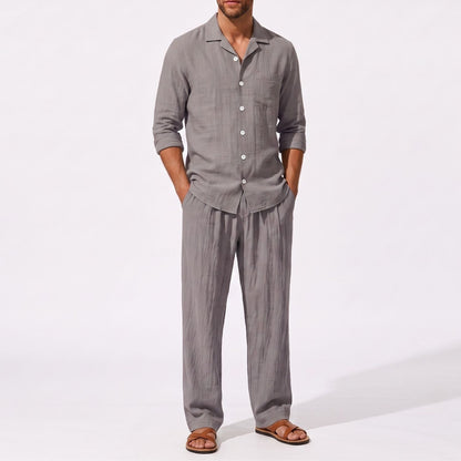 Grey men's two piece linen-blend set with Grandad collar shirt and straight-leg trousers, closer front outfit view