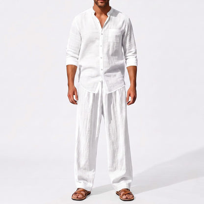 White men's two piece linen-blend set with Grandad collar shirt and straight-leg trousers, closer front outfit view
