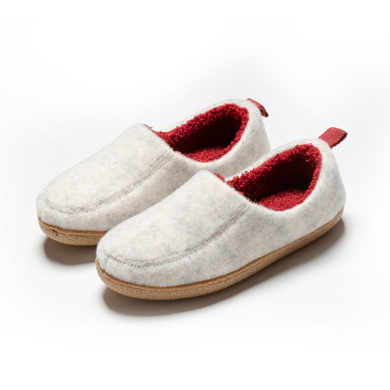 White house slippers with red fleece lining, shown as a pair at an angle