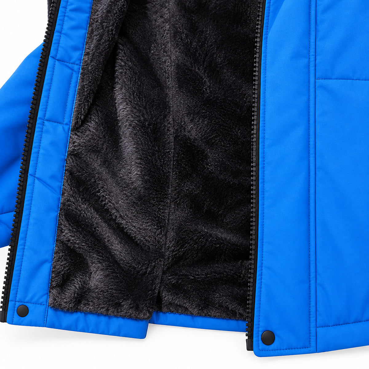 Close view of the jacket’s black fleece body lining, blue front facing and lower hem