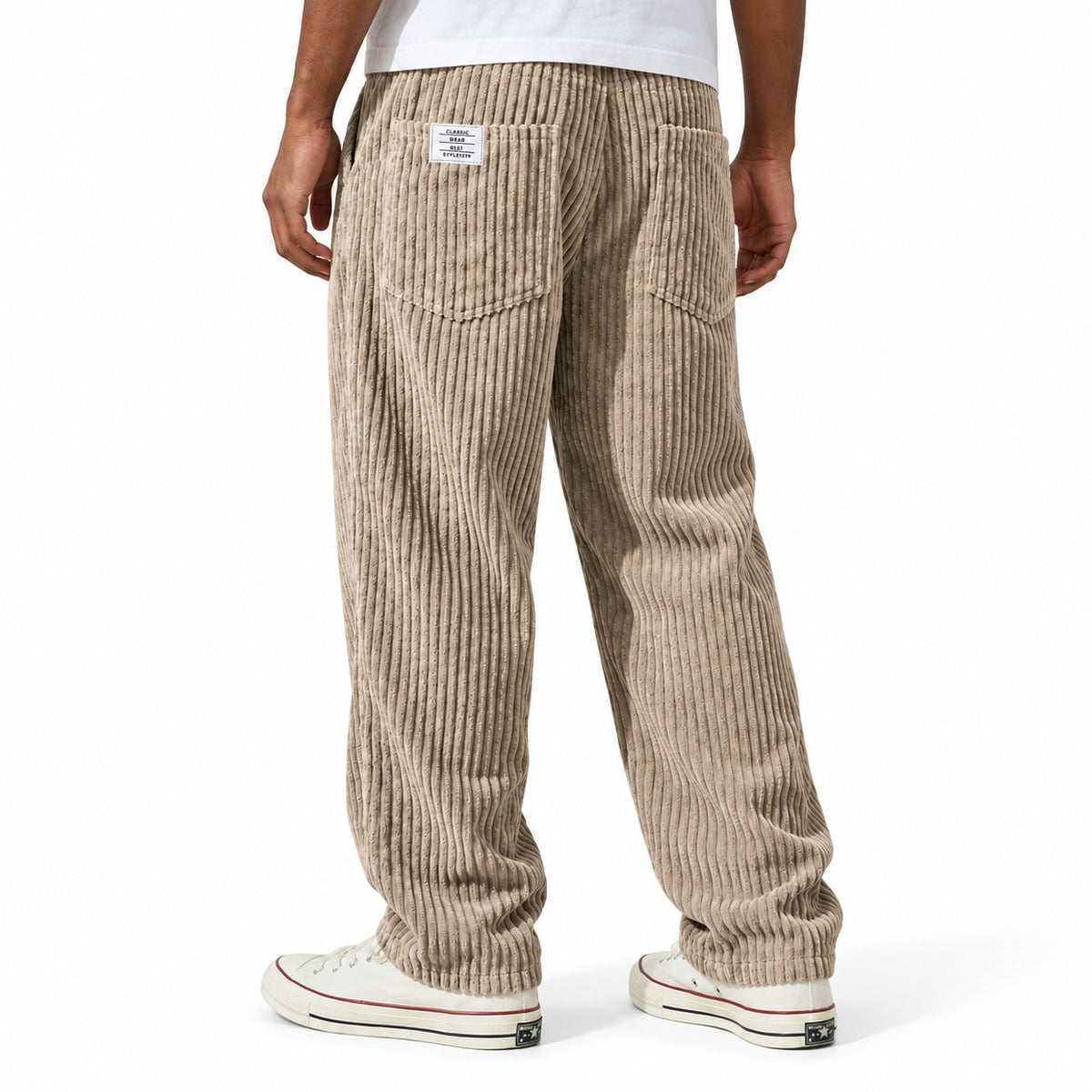Khaki ribbed straight-leg trousers shown from the rear three-quarter, with elasticated waist and rear patch pockets