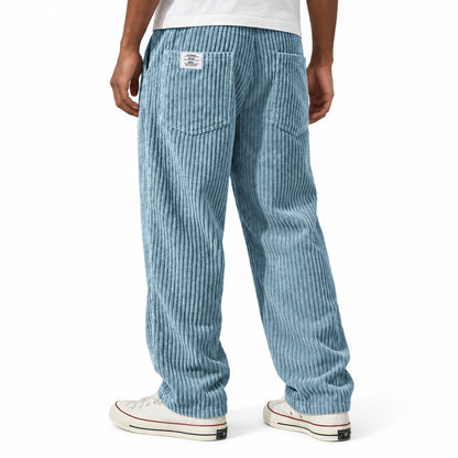 Light Blue ribbed straight-leg trousers shown from the rear three-quarter, with elasticated waist and rear patch pockets