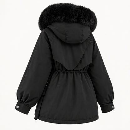 Rear three-quarter view of the black hooded parka, showing the rounded layered back yoke, gathered waist and snap cuffs.