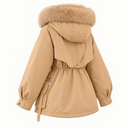 Rear three-quarter view of the khaki parka showing its rounded layered back yoke, hood and gathered waist.