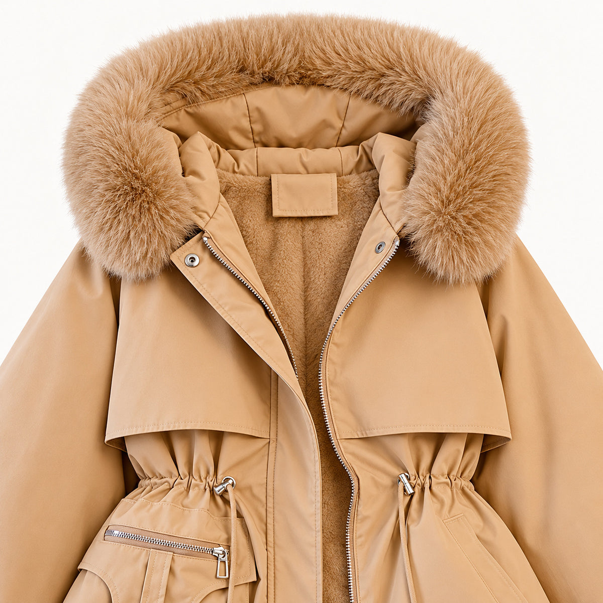 Close view of the khaki parka's fluffy hood trim, soft plush lining, layered front panels and drawcord waist.