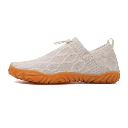 White barefoot walking shoes, isolated side studio view