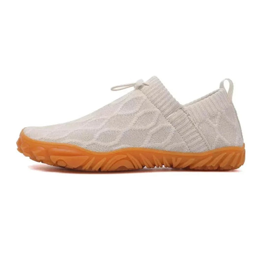 White barefoot walking shoes, isolated side studio view