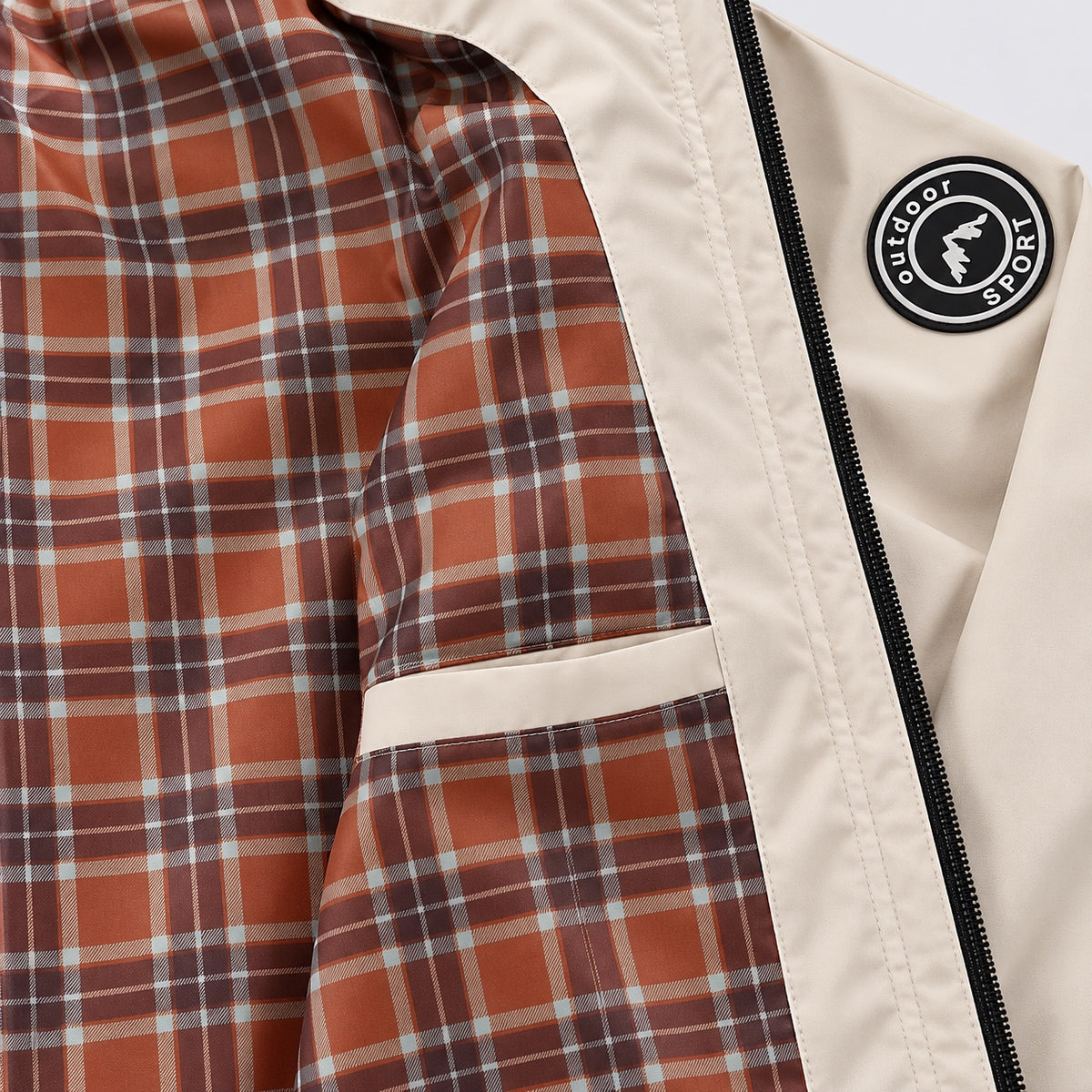 Rust-brown checked jacket lining with a beige-bound inside pocket.
