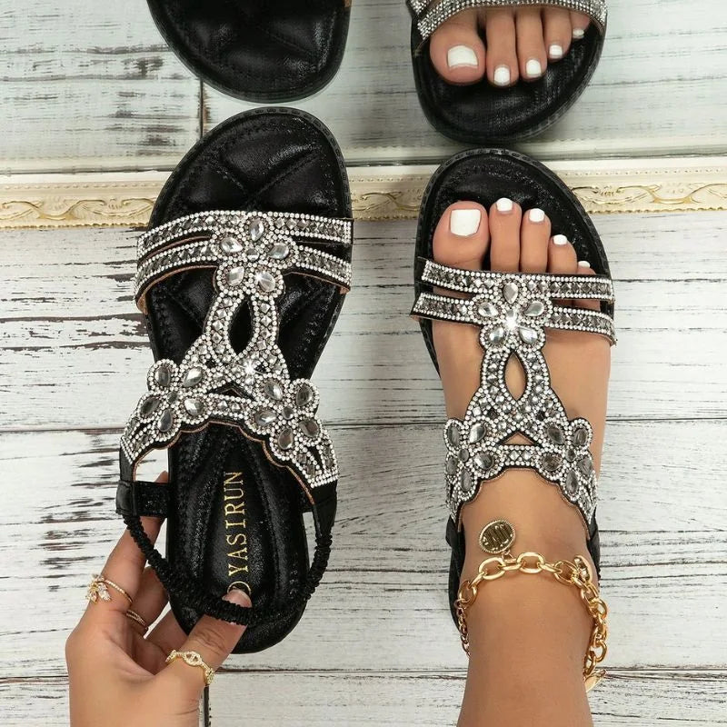 Black embellished sandals for women, top-down on-foot view