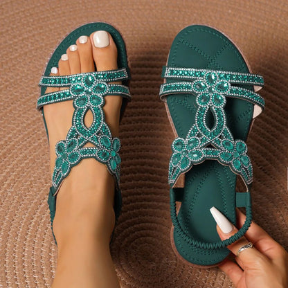 Dark green embellished slingback sandals, top-down pair view