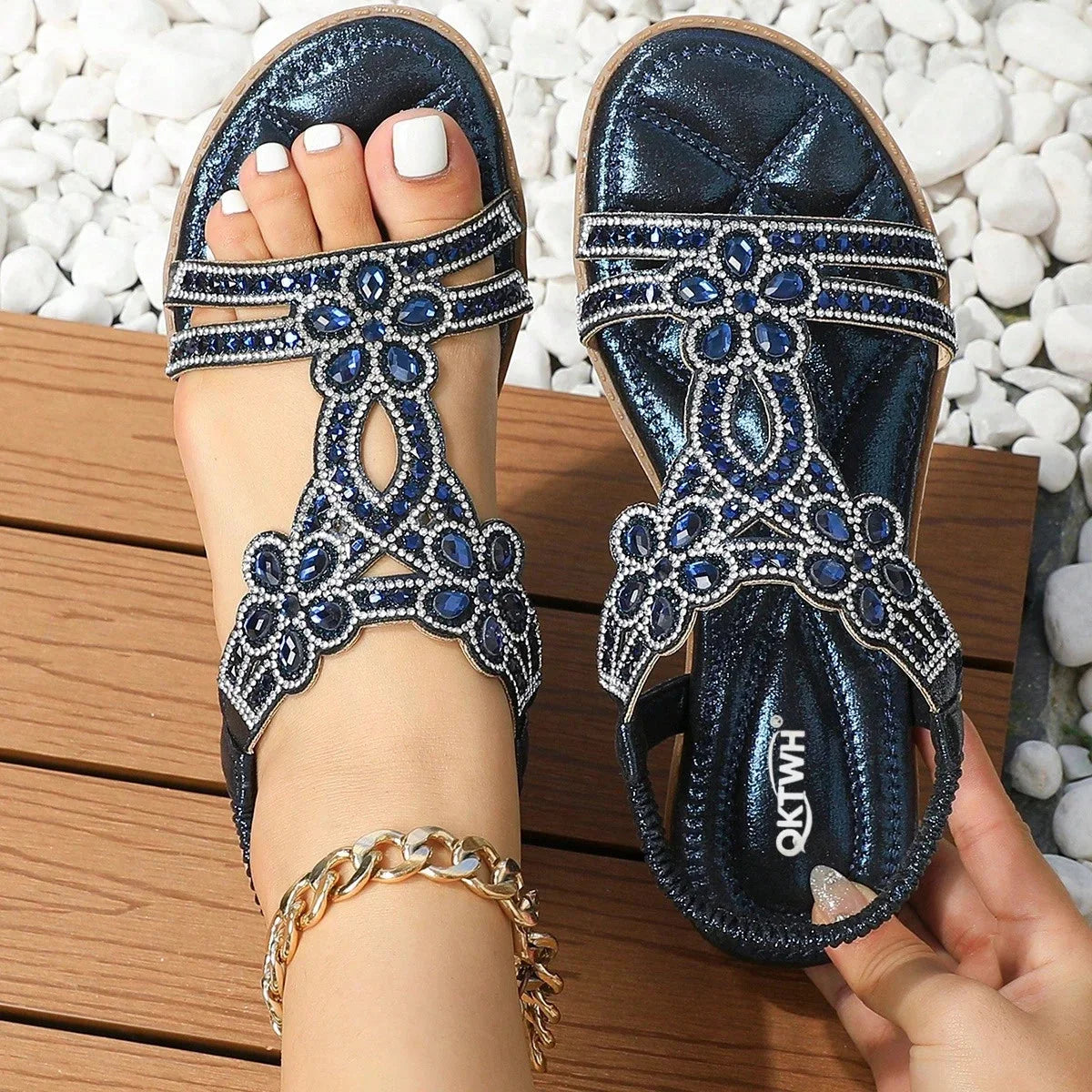 Dark blue embellished slingback sandals, top-down pair view