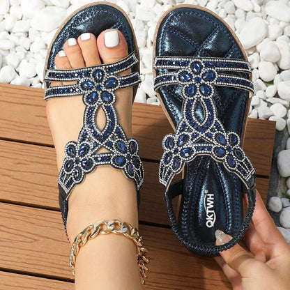 Dark blue embellished slingback sandals, top-down pair view