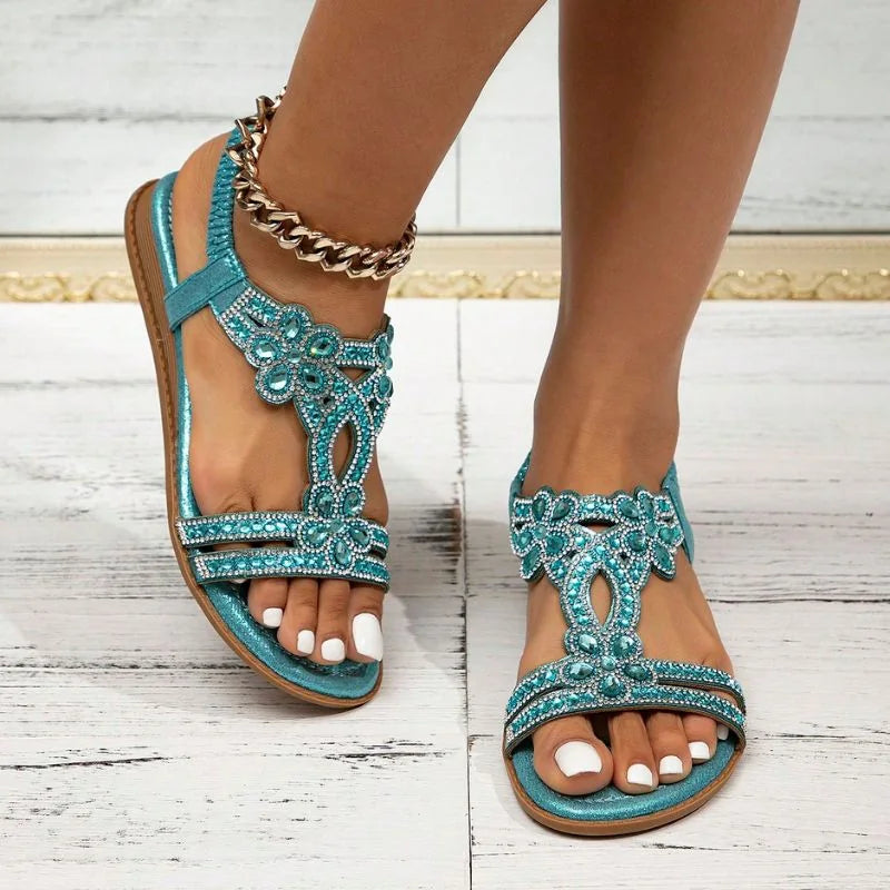 Light blue embellished slingback sandals, front on-foot wood-floor view