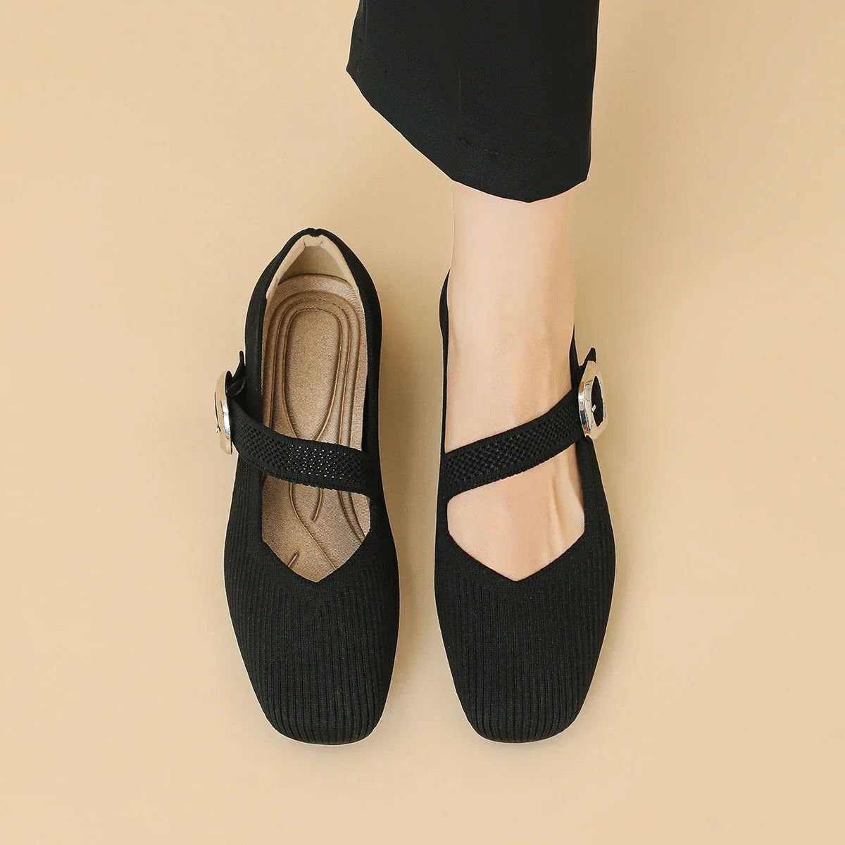 Women's black square toe Mary Jane flats shown from above and on foot