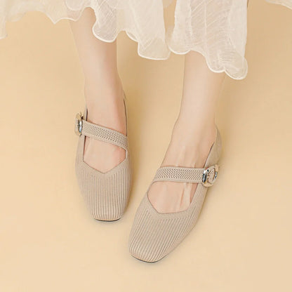 Women's beige square toe Mary Jane flats worn from above